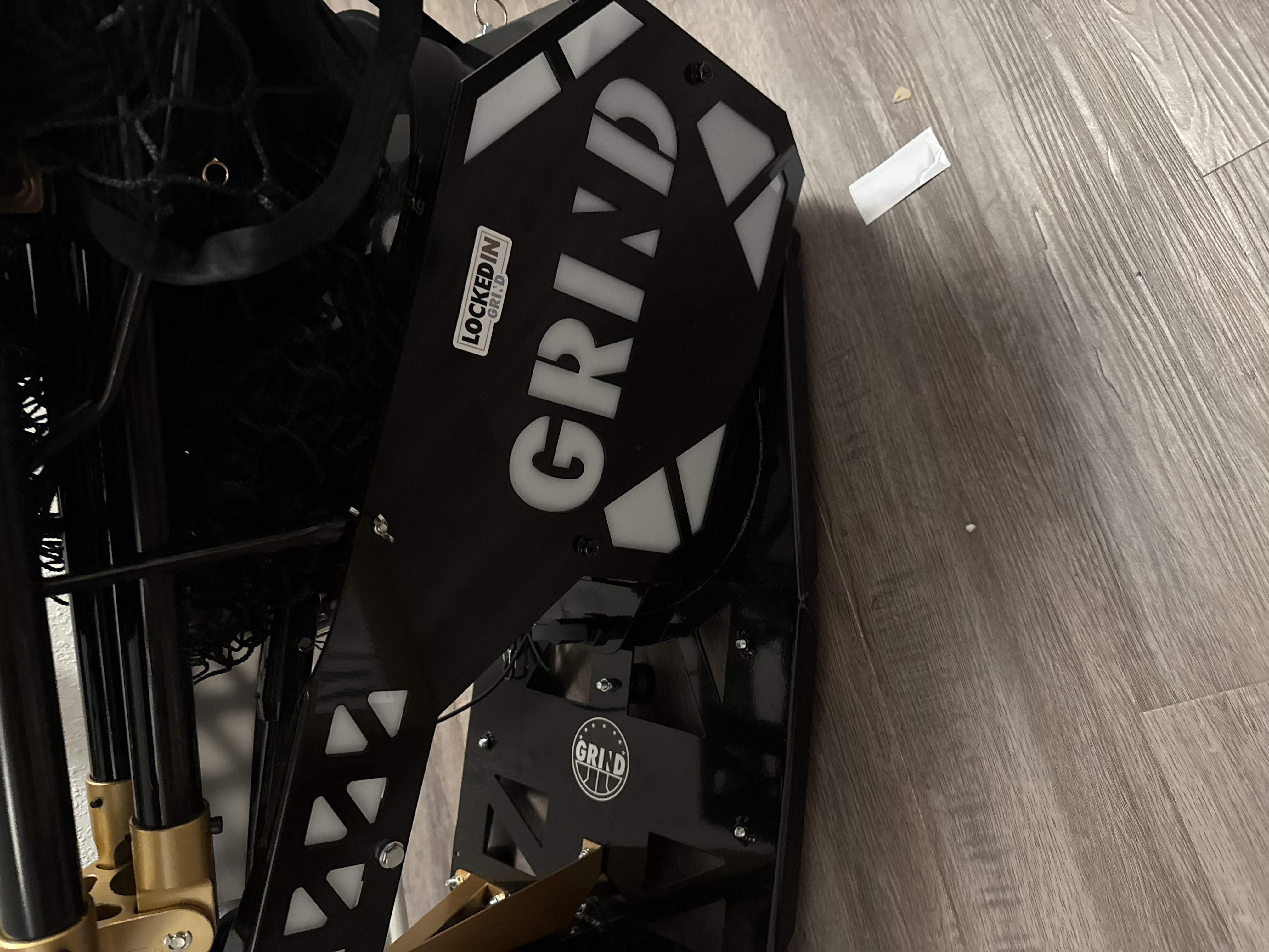 The Grind Machine shooting rebounder used for high-rep shooting sessions